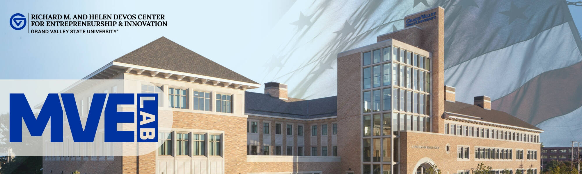 Seidman College of Business with a flag in the background